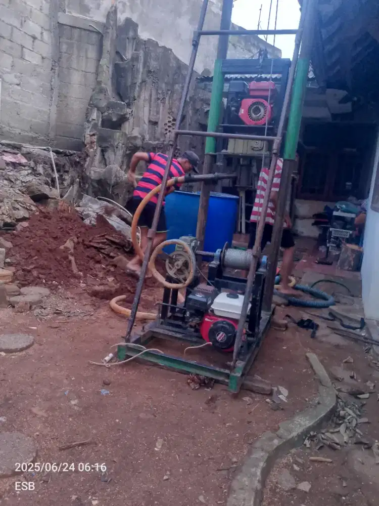 Tukang sumur bor air