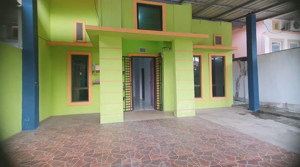 DI JUAL CEPAT RUMAH ROW JALAN 15 METER DI BUANA RAYA BATU AJI