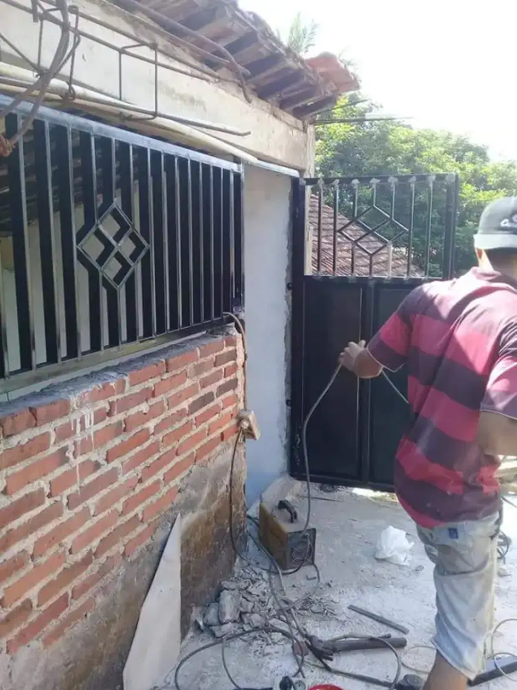 Tukang las perbaikan pagar garasi panggilan