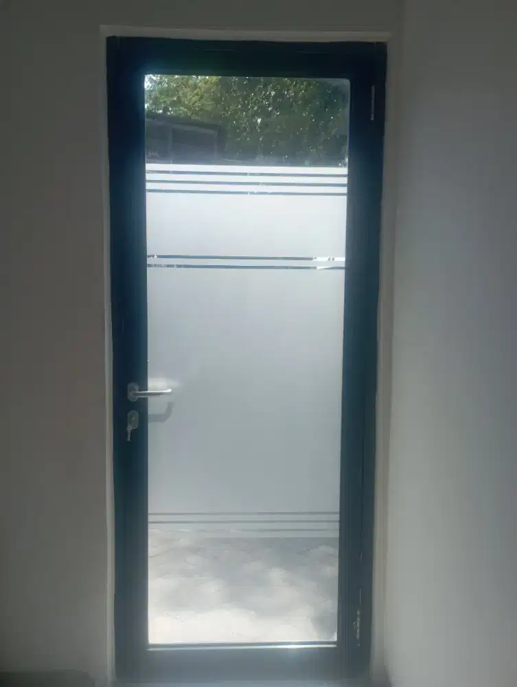 Stiker sandblast kaca film gedung