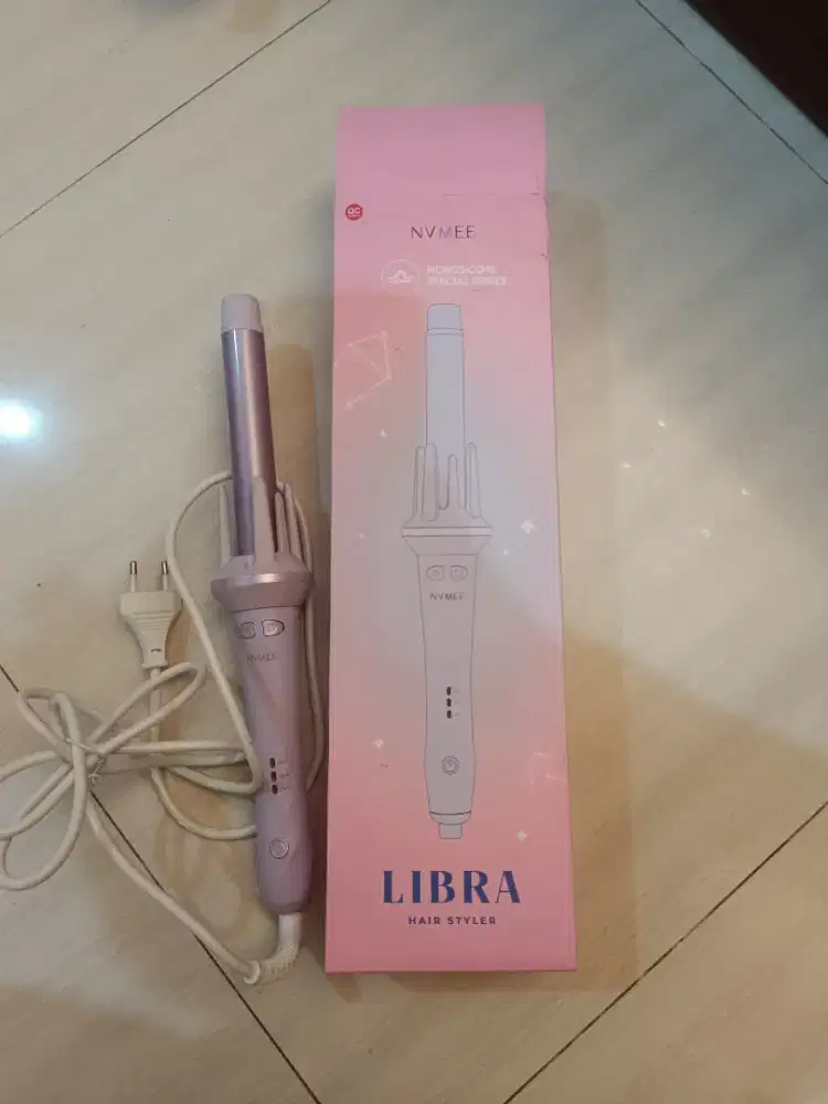 Catok rambut keriting otomatis