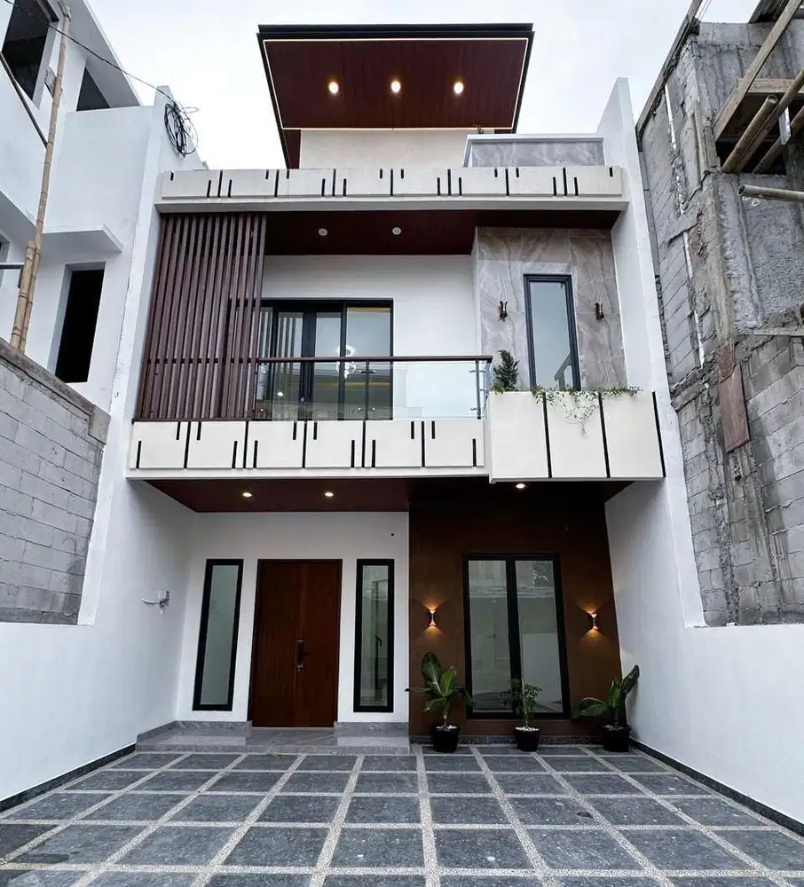 Rumah Modern dengan Rooftop dan Taman dalam Cluster akses utama