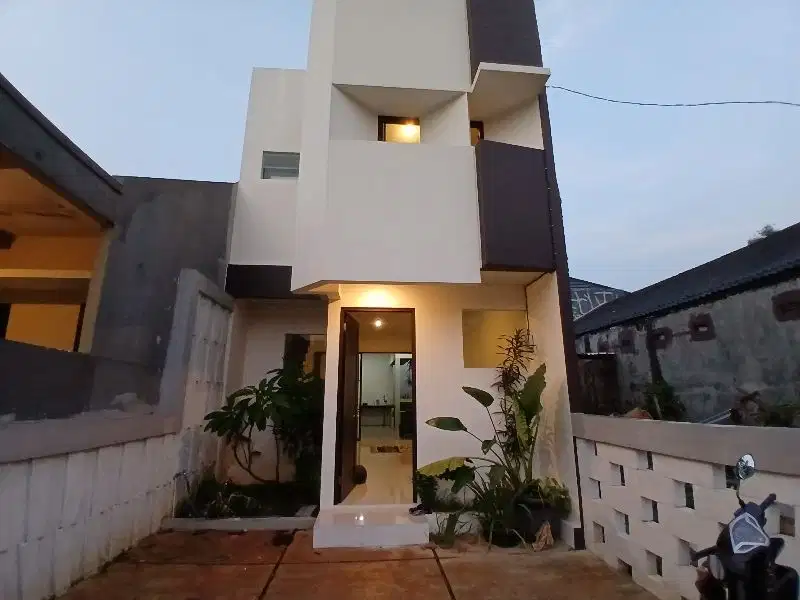 Rumah Tropis Modern  bebas banjir strategis di komplek Asabri Jatiasih