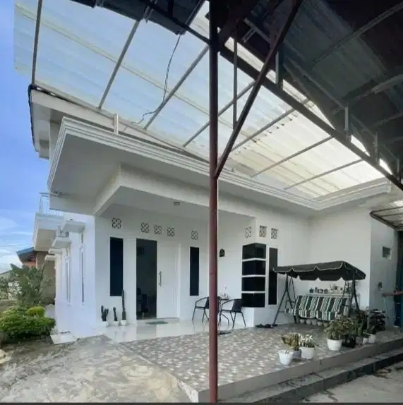 Dijual Rumah + bengkel mobil.  Jln Sikam. Kalidoni.