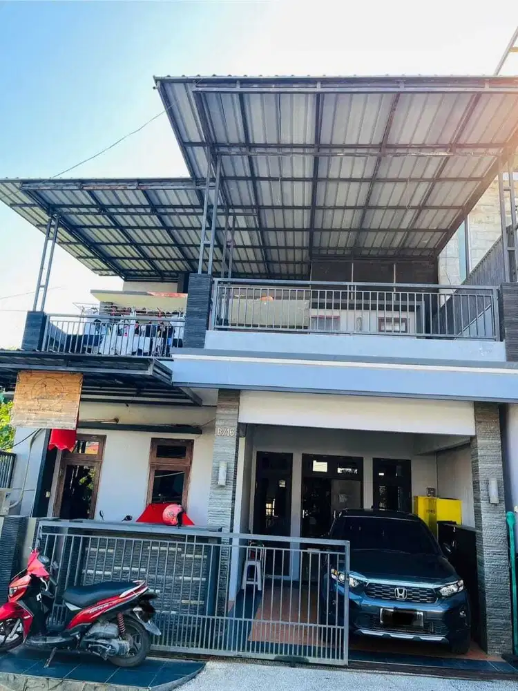 di jual rumah 2 lantai beserta isinya