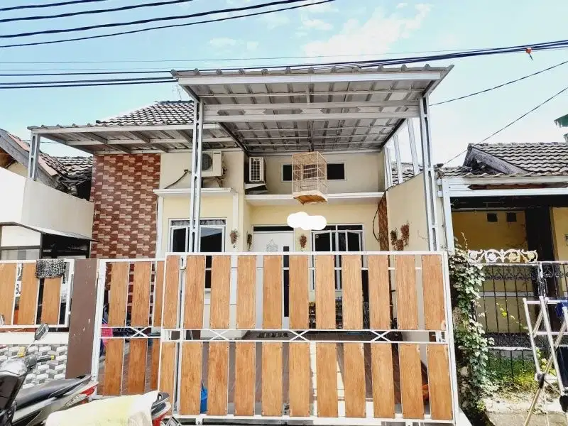 di jual rumah full renovasi citra indah city