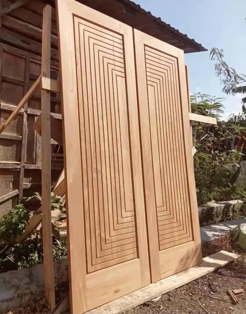 Pintu kayu jati kupu tarung modern