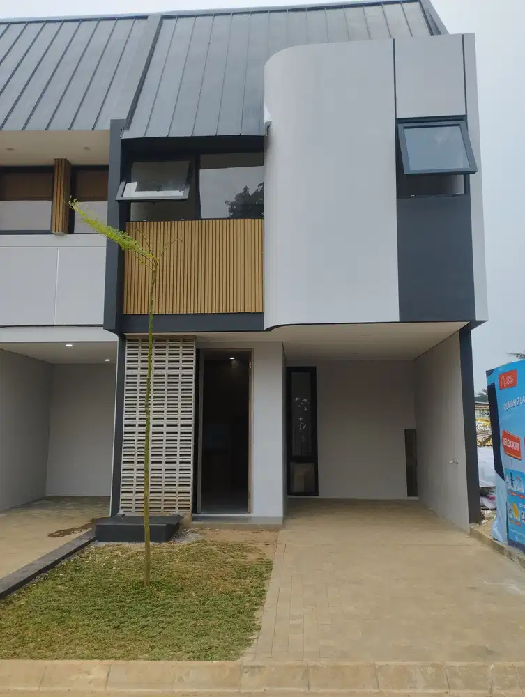 DP ringan rumah 2 lantai 3 kamar tidur  lokasi dekat pintu toll