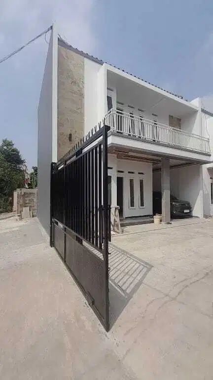 Rumah dalam komplek bebas banjir akses 2 mobil larangan