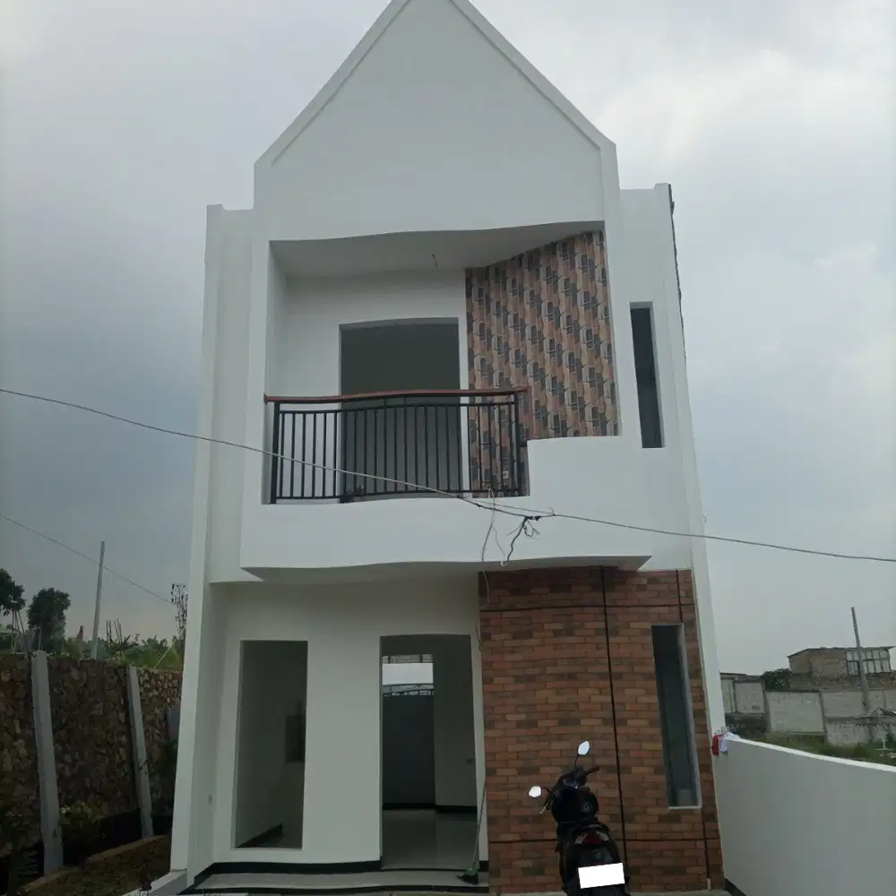 RUMAH SIAP HUNI DI CIPAGERAN DENGAN NUANSA ASRI DAN SEGAR