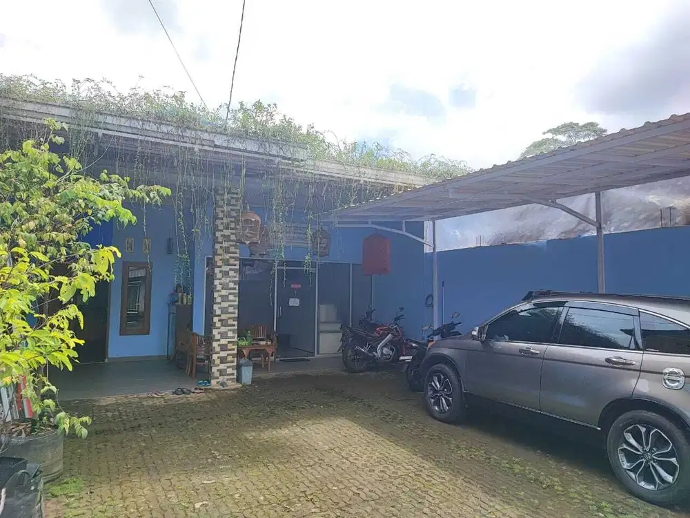 Rumah tinggal lengkap dengan kantor pinggir jalan