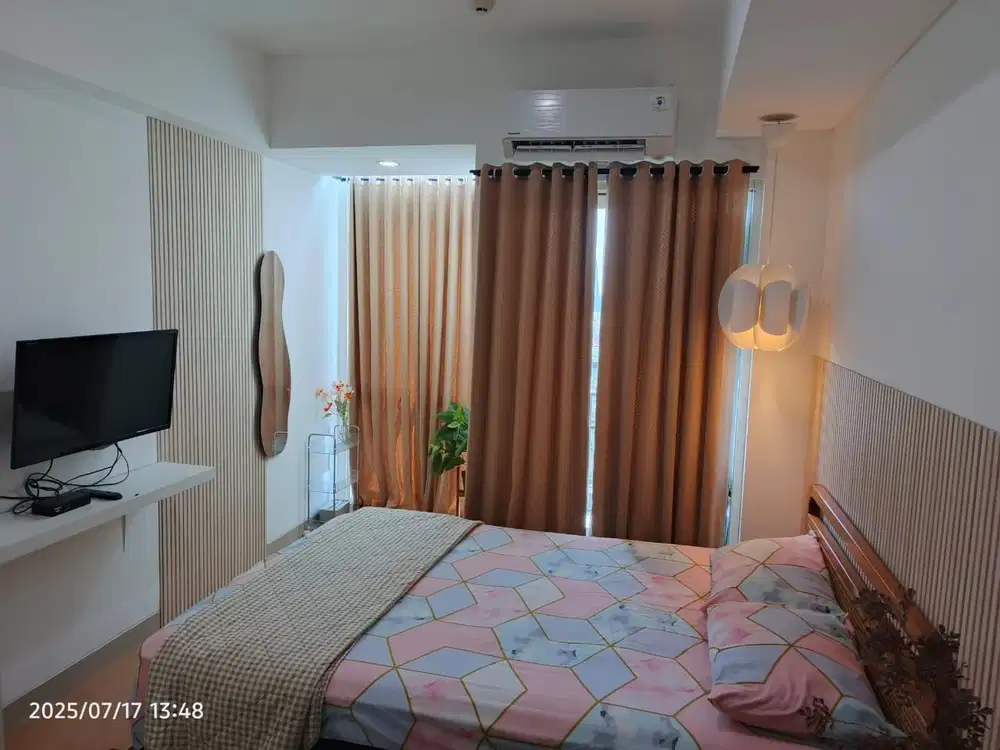 Sewa apartemen papilio studio furnished estetik