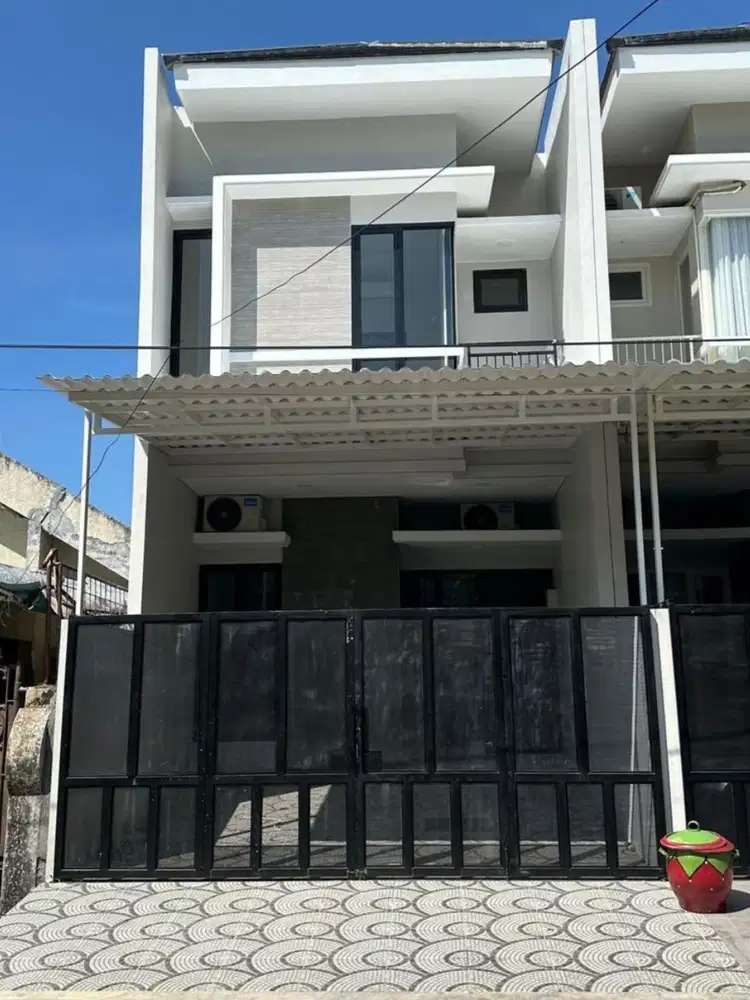 Rumah Kutisari Indah Utara - Gress Baru Model Minimalis