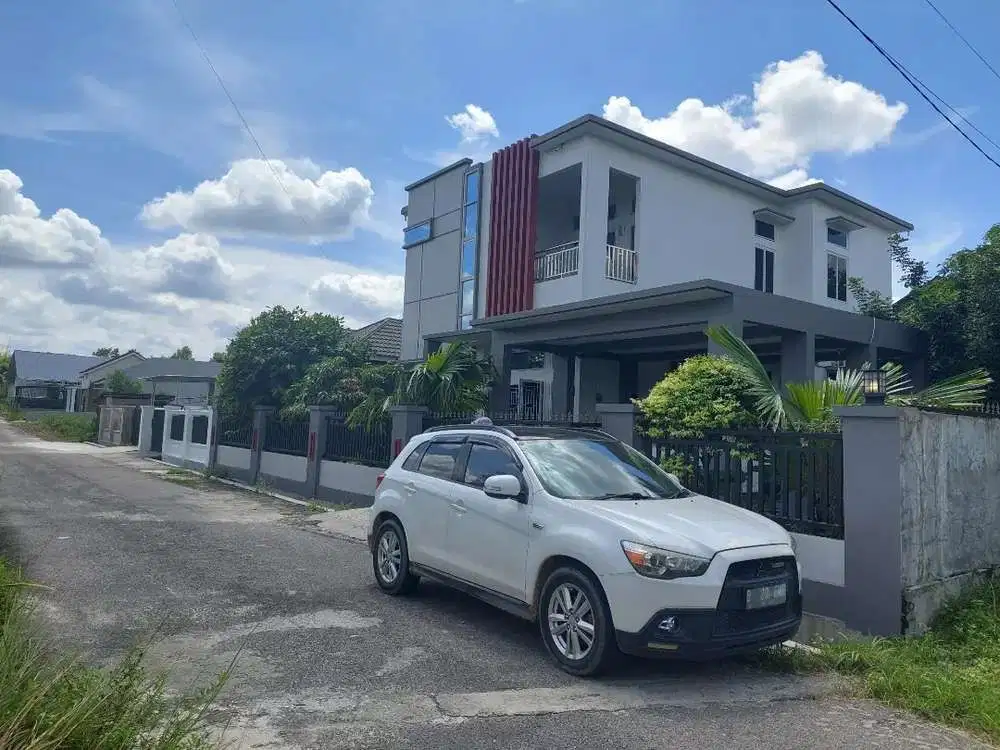 Rumah dekat Simpang bukit Barisan Harapan Raya.