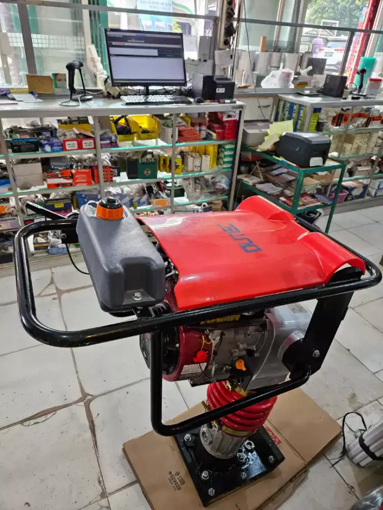 Mesin stamper pemadat