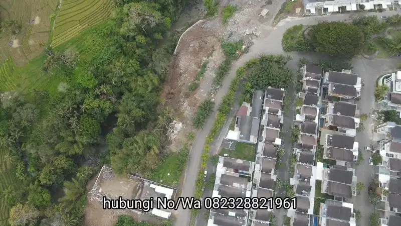 Tanah full view Jungle dan los sungai di jalan raya Canggu