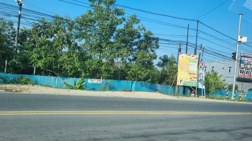 Tanah 1,2 H pinggir jalan soekarno hatta km 7