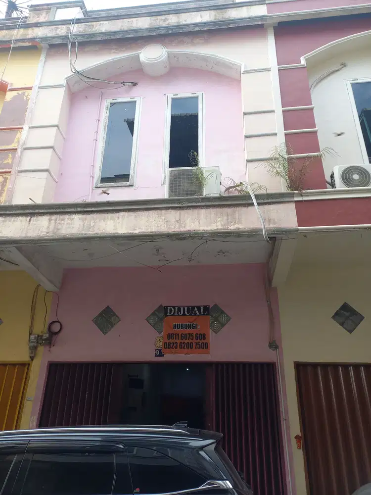 Rumah 2 tingkat titikuning