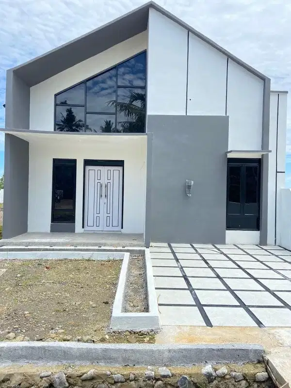 PERUMAHAN DI TEPI JALAN RAYA KALUMBUK