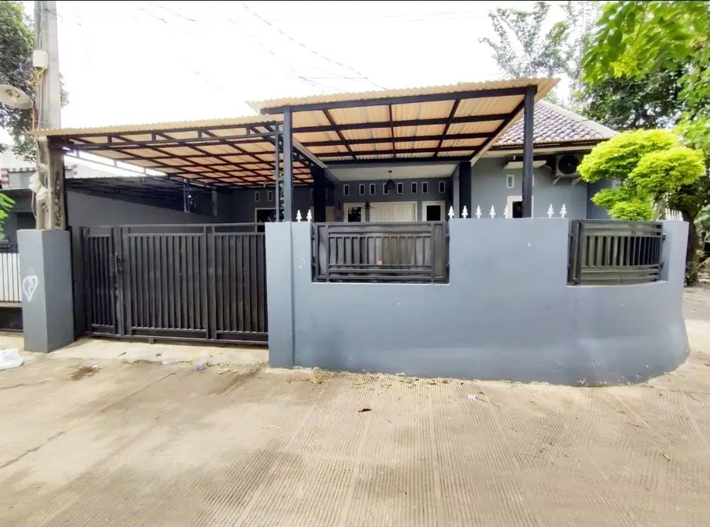 Rumah siap huni di jatibening kec.pondok gede LT.130m garasi mobil