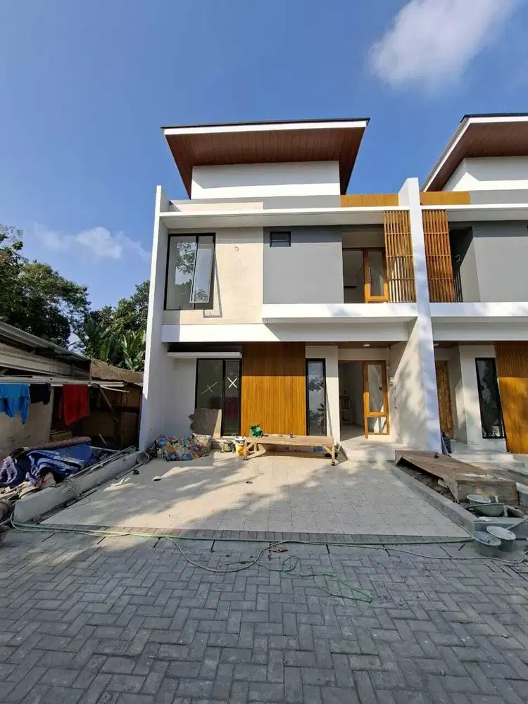 RUMAH MEWAH MODERN KONTEMPORER 2 LANTAI DALAM MINI CLUSTER DI TLOGOADI