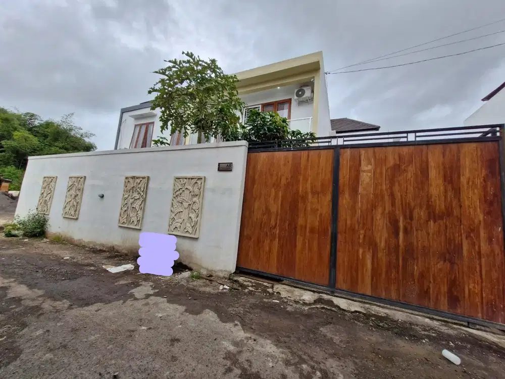 RUMAH MODERN DALAM KOMPLEKS BEBAS BANJIR DI JIMBARAN
