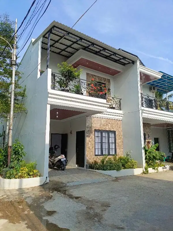 RUMAH MEWAH FASILITAS LENGKAP DEKAT LRT &TOL BEBAS BANJIR