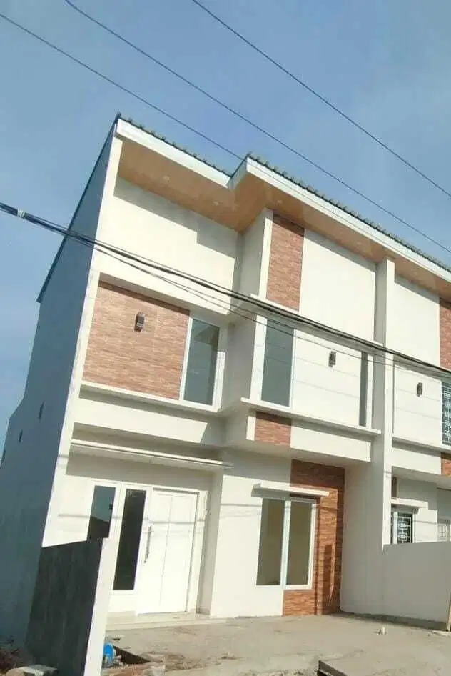 Rumah 2 lt harga 1 lt di kawasan elit Hertasning harga 600 jutaan