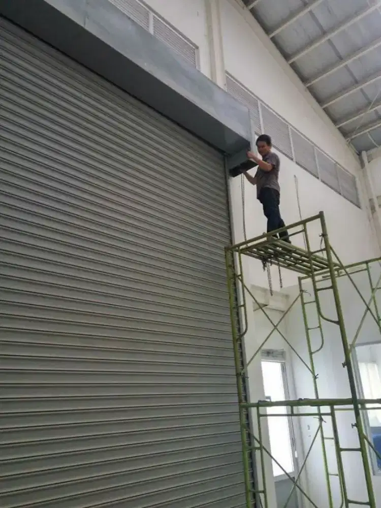 Folding gate rolling door Henderson tebal bergaransi