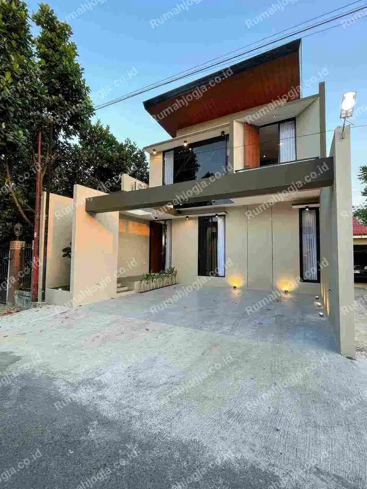 rumah mewah kontemporer full furnish maguoharjo