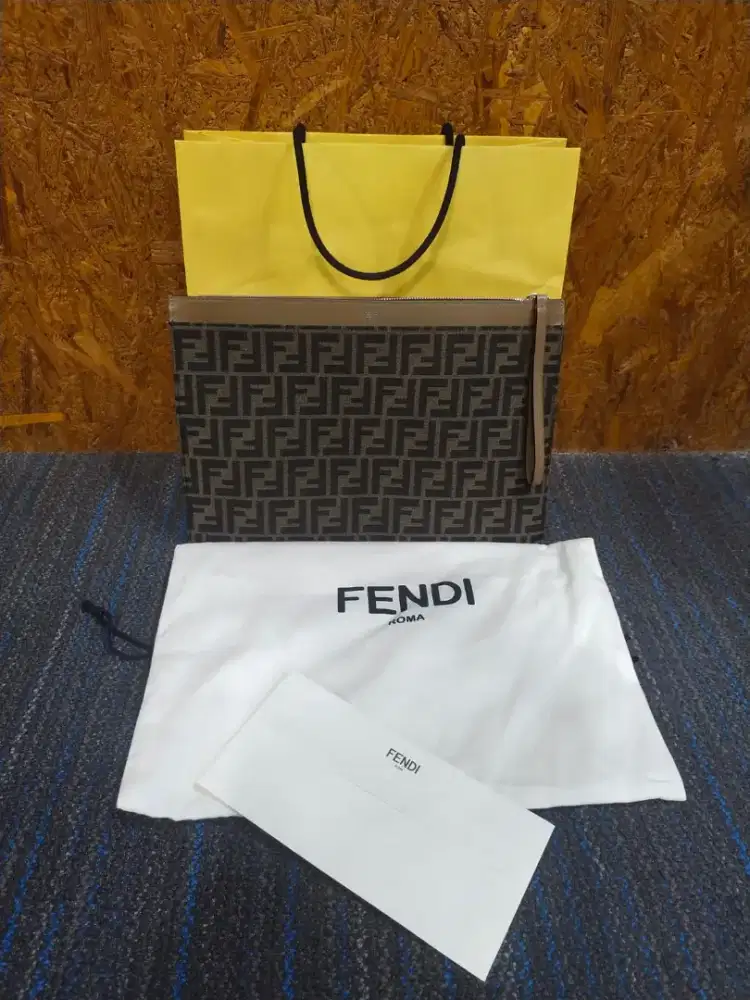 NBU .. Fendi monogram clutch