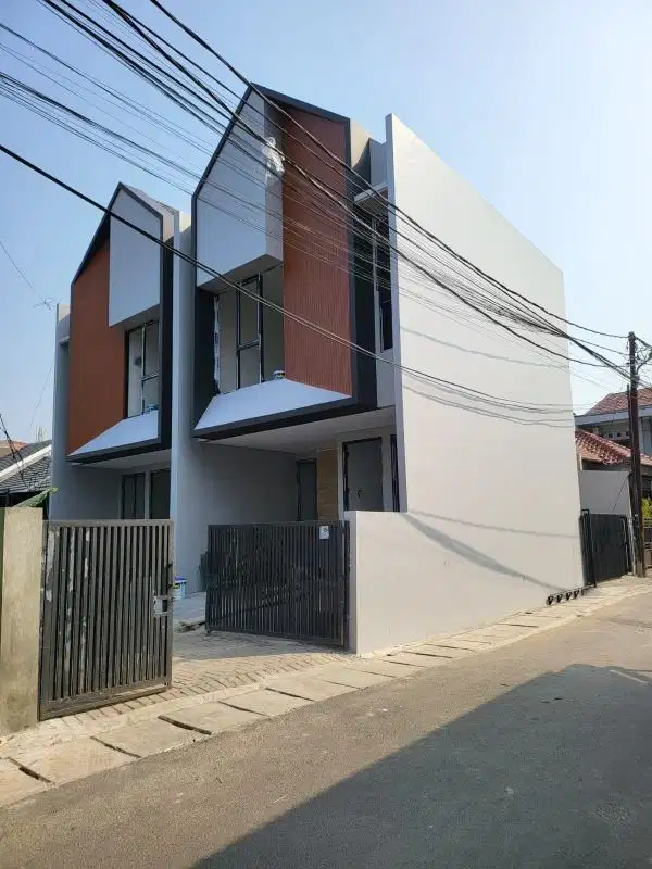 Rumah Cluster Cipayung,Full Bata merah Jakarta Timur