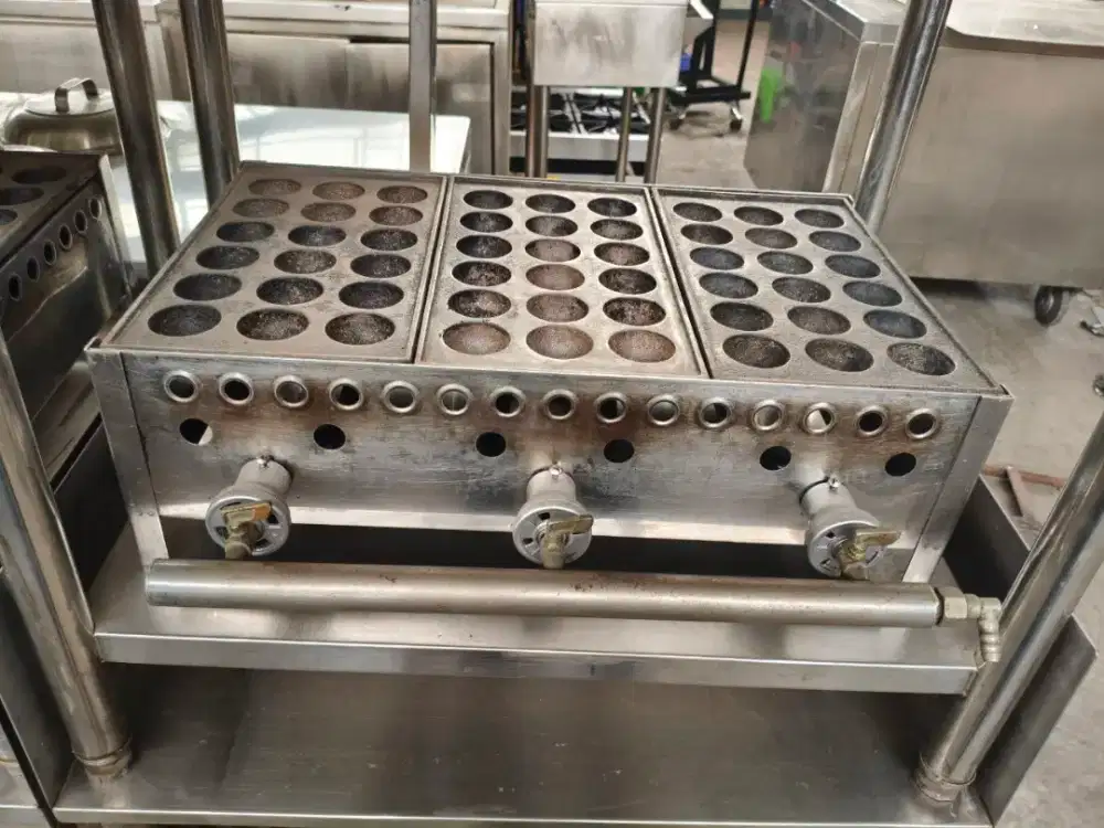 Cuci gudang kompor takoyaki