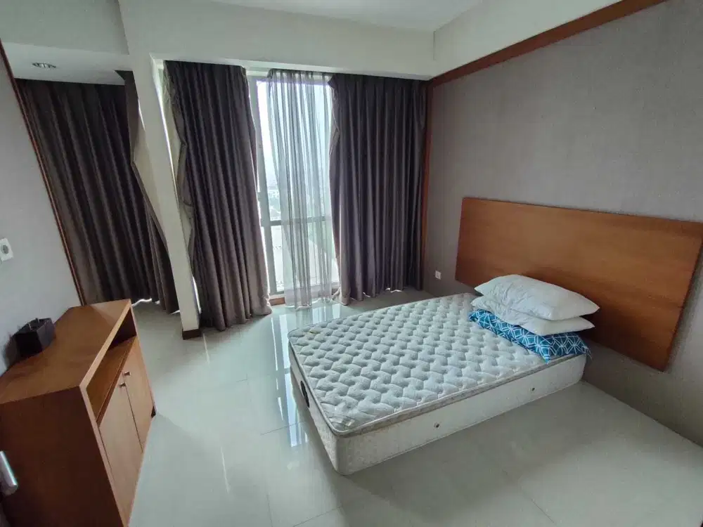 Disewakan apartemen st.moritz 2 kamar semi furnish