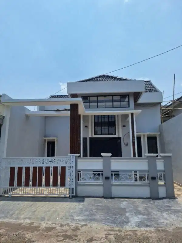 Rumah di jalur bulevard dlm cluster, elegan, di Citra Indah City