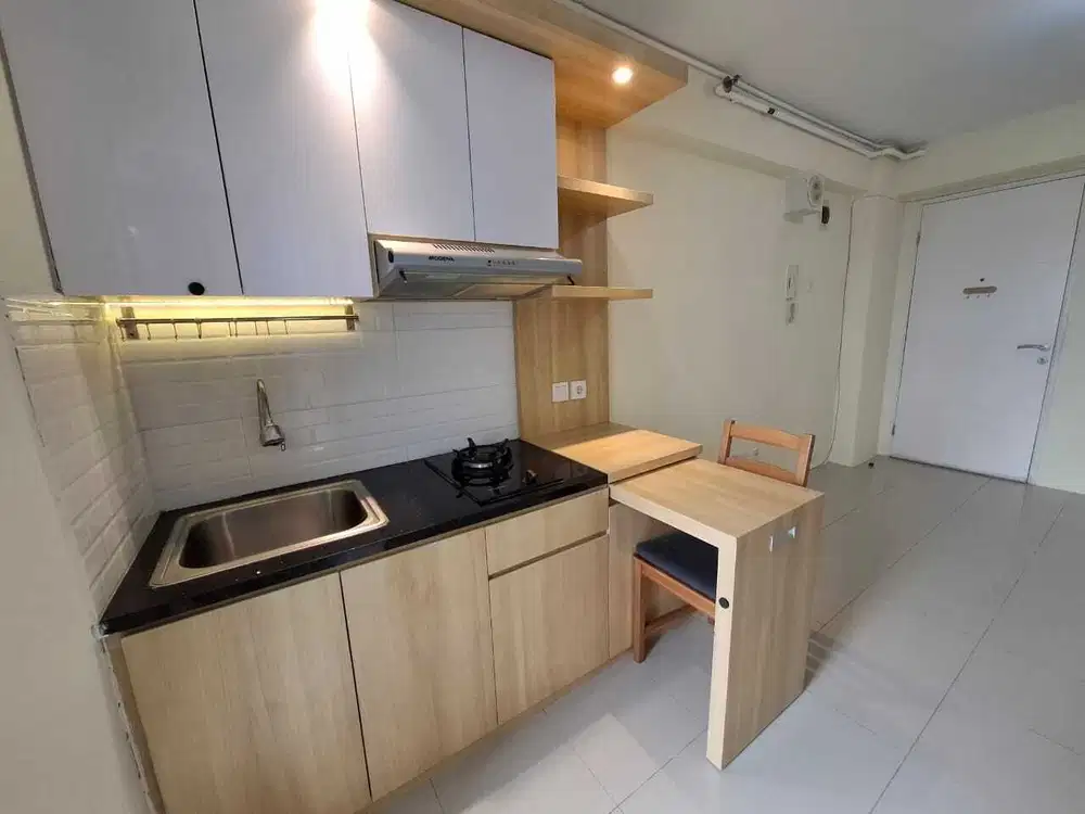 Sewa Studio Semi Furnish Tower Cattleya - View pool - Bassura City