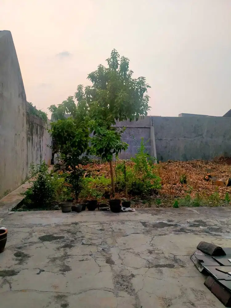 RUMAH BESAR DAN TANAH SISA HADAP TIMUR HARGA TERMURAH DI CITRA 1 EXT