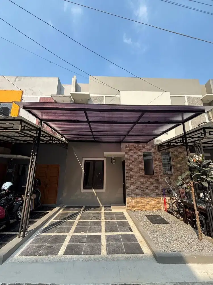 DIJUAL RUMAH DALAM CLUSTER SUDAH RENOVASI