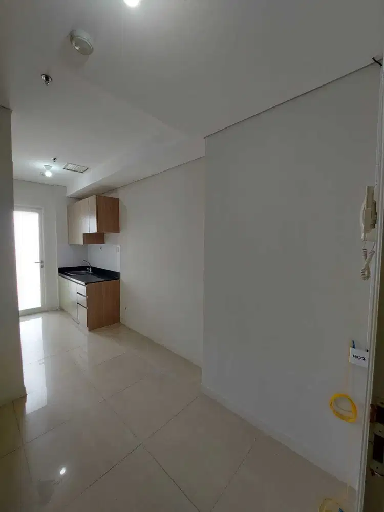 1BR Unfurnished Apartemen Madison Park - Mall Central Park