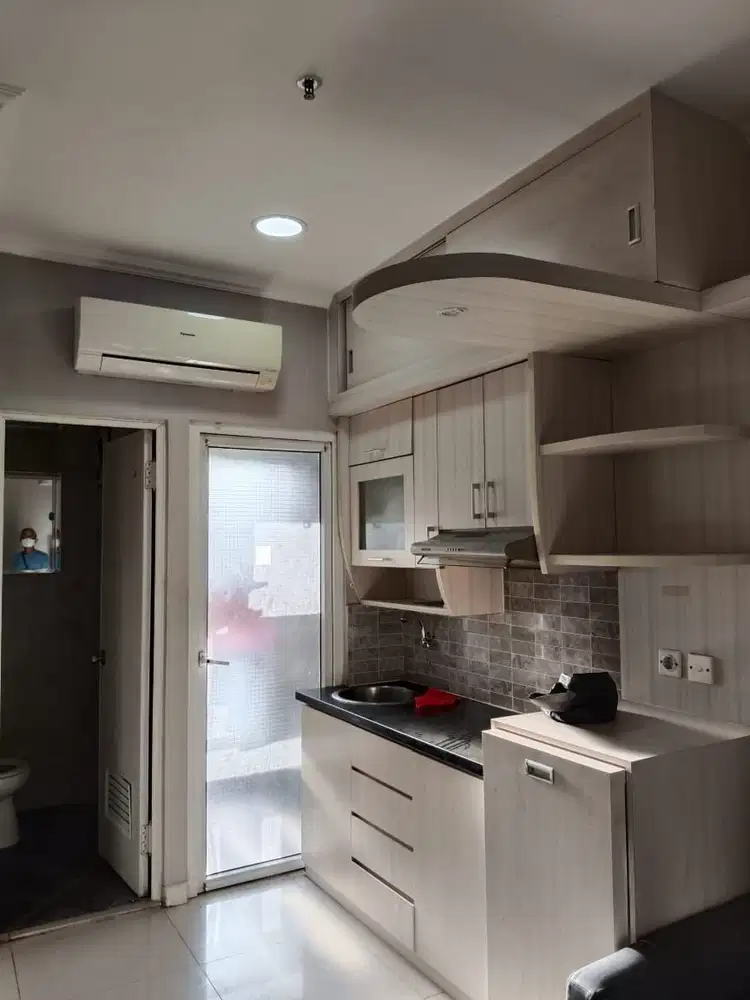 Apartemen the green pramuka city 2 kamar furnish tower chrysant