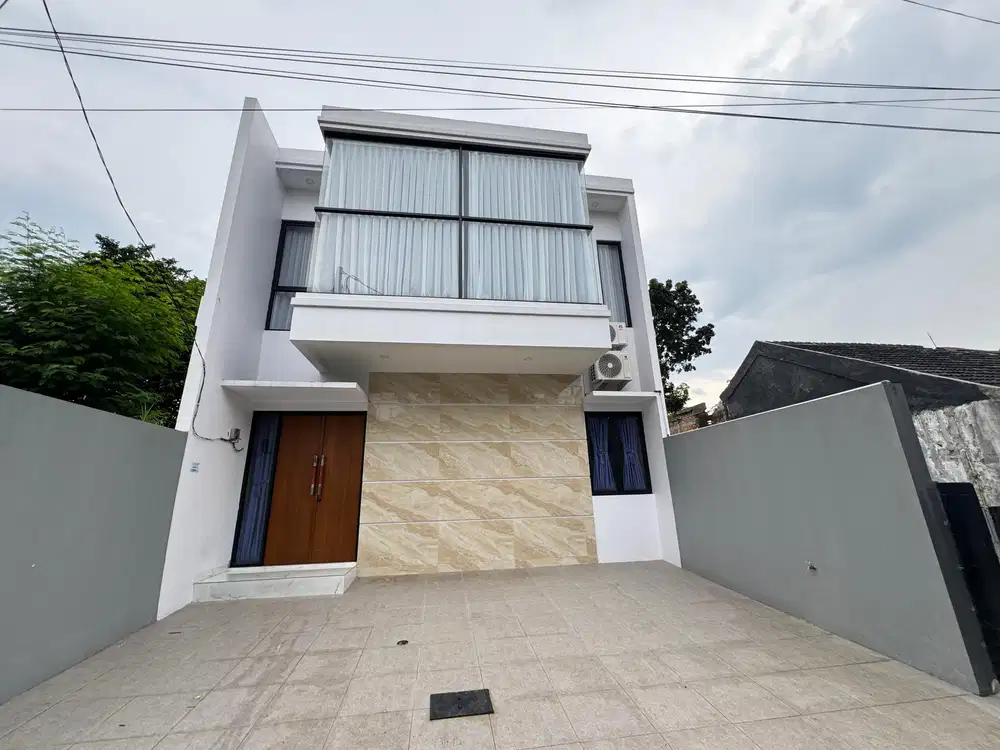 Rumah Cantik Desain Modern di Limus Pratama