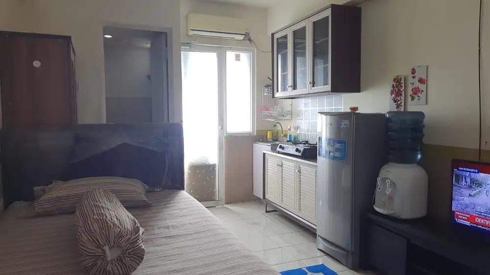 Apartemen the green pramuka city studio Furnish