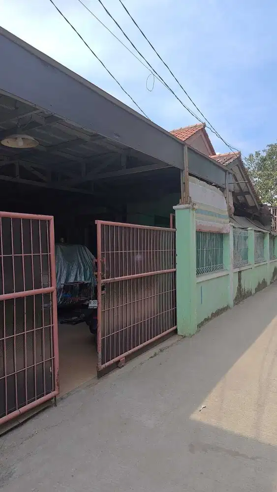 Rumah dan 2 kontrakan Di Karang Tengah Tarumajaya , Bekasi (e0119off)
