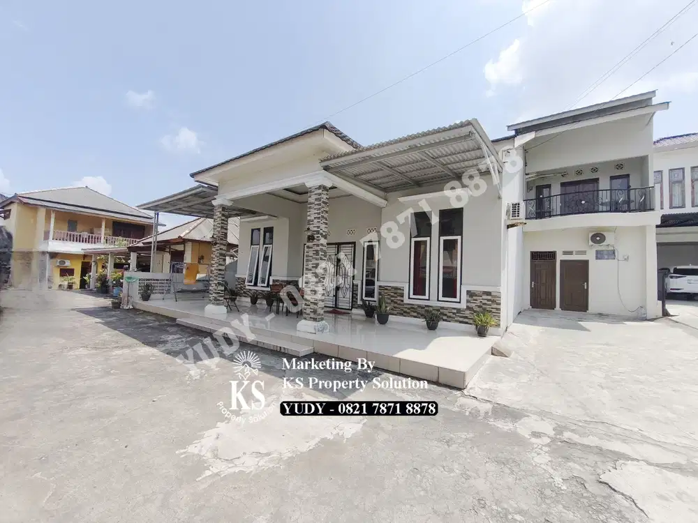 Rumah di jalan Demang Lebar Daun Tanah Luas di Kota Palembang