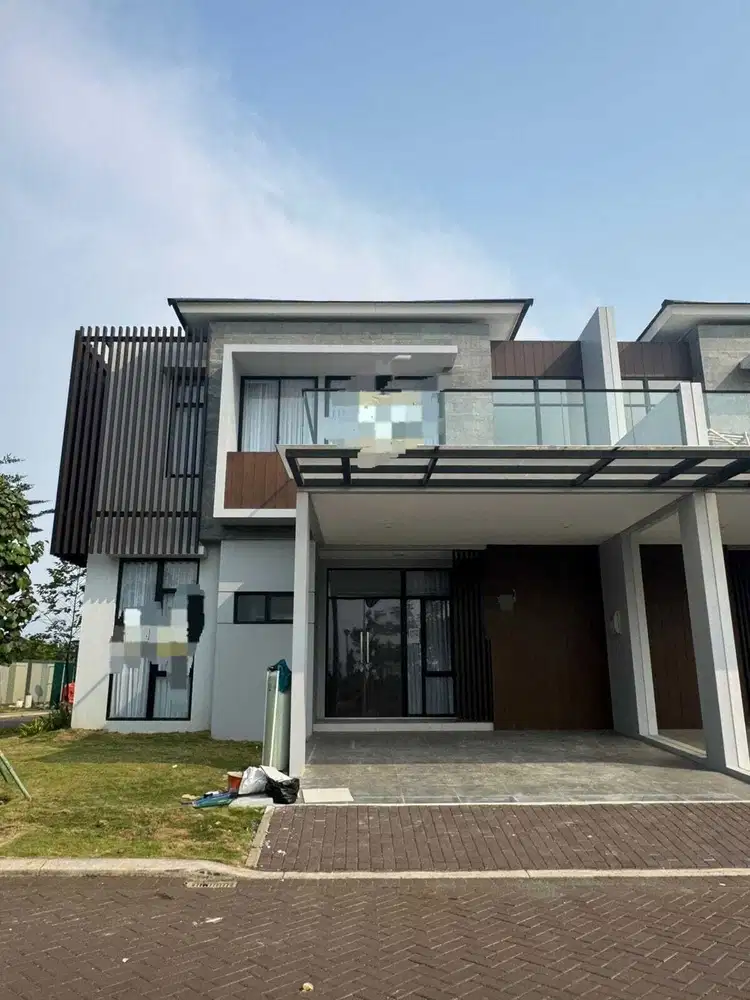 Disewakan rumah pik2 milenial 4 kamar tidur semi furnish 10x20