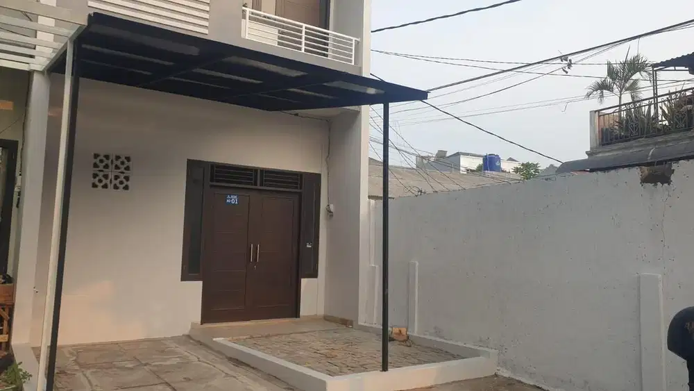 Dijual Murah  BU rumah 2 Lantai baru renovasi. Siap tinggal