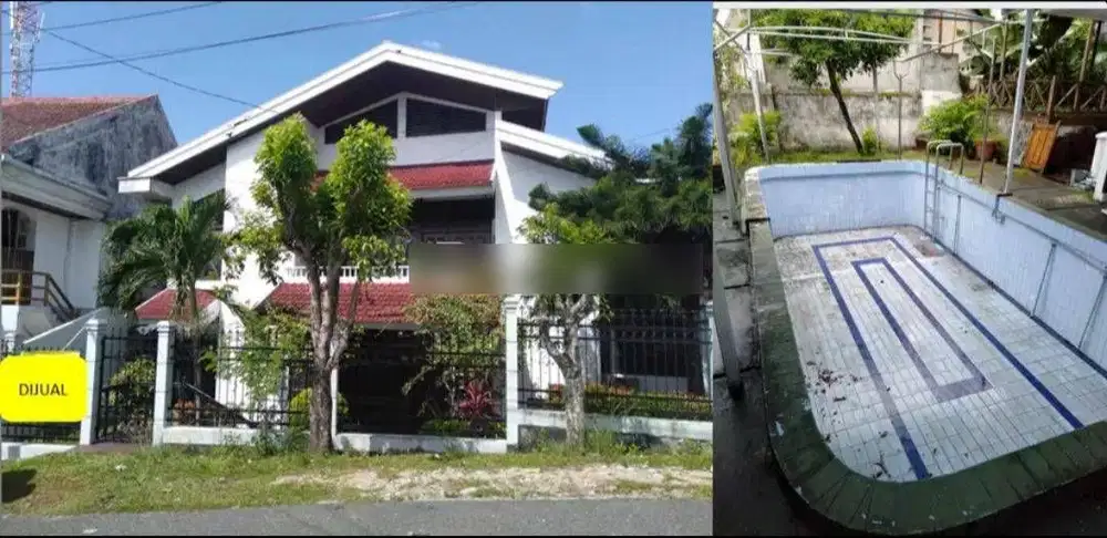 RUMAH BESAR  SEMIFURNIS DENGAN KOLAM RENANG LOKASI TENGAH KOTA