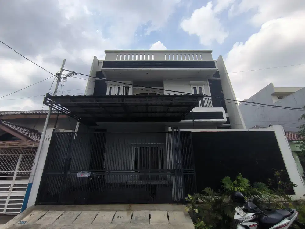 RUMAH 2,5 LANTAI SUNRISE GARDEN SIAP HUNI