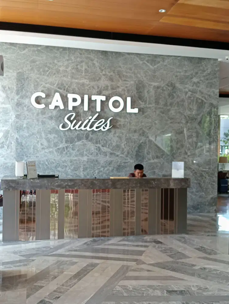 Apartemen Capitol Suites
