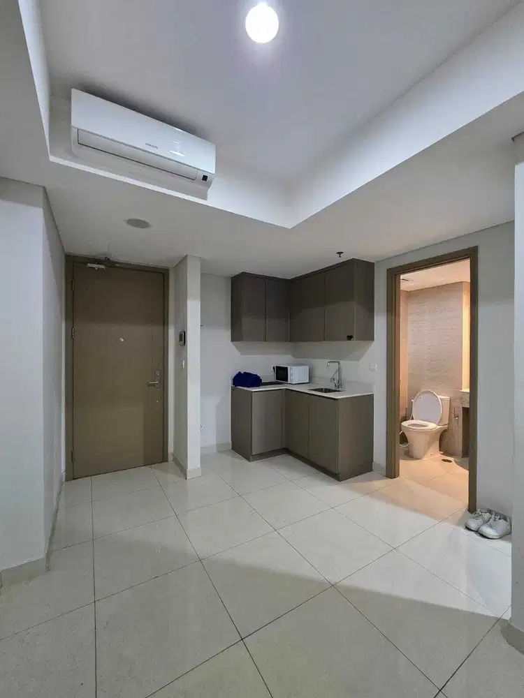 Disewakan Apartemen Gold Coast PIK 2BR, 62m2, Semi Furnish, Sea View